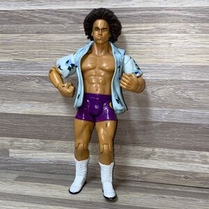 Action Figure with Blue Shirt and Purple Shorts